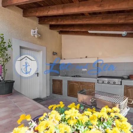 Casa de Férias Maison Flamants Roses Avec Piscine Le Grau-du-Roi